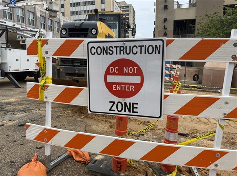 Construction Zone - Road closed sign barricade
